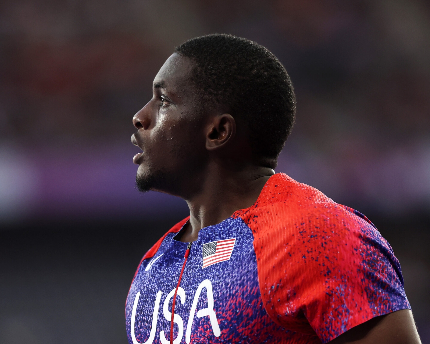 A gentleman stares into the crowd wearing a Team USA uniform.