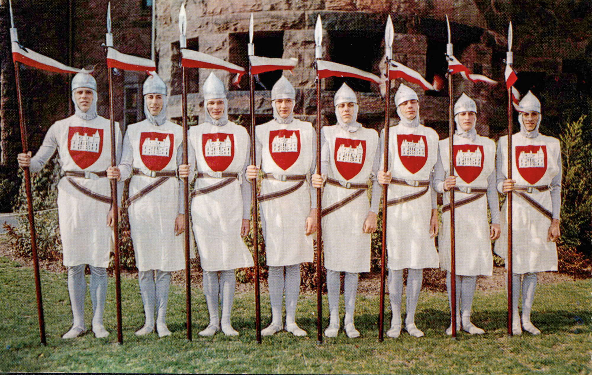 A vintage postcard shows students dressed up as Knights.