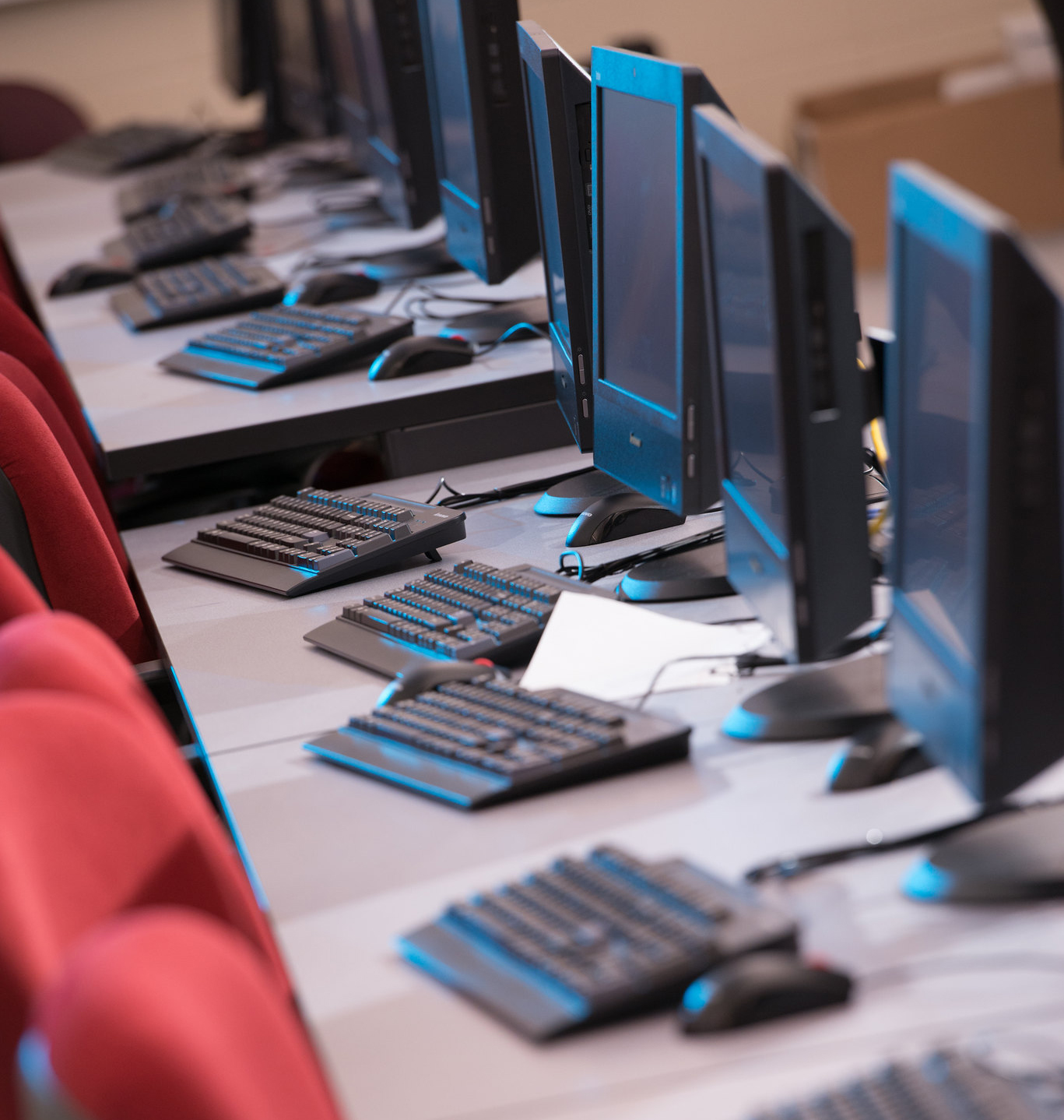 A bank of computers in a lab.