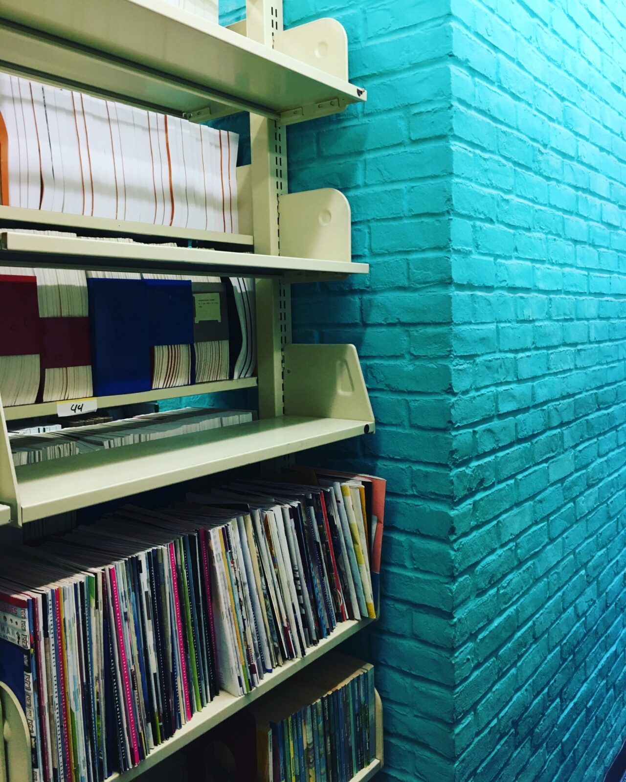 Library shelves stocked with periodicals.